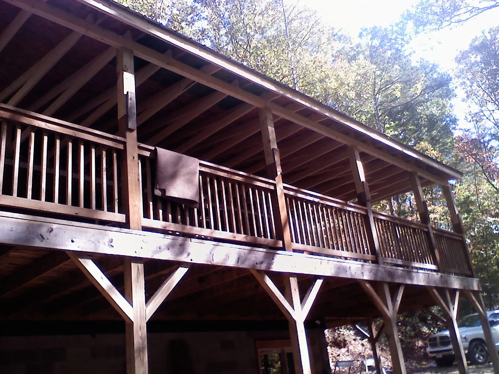 Timber framing under a new elevated porch and deck — Roof Leak Repair in Girard by Roofing Brothers